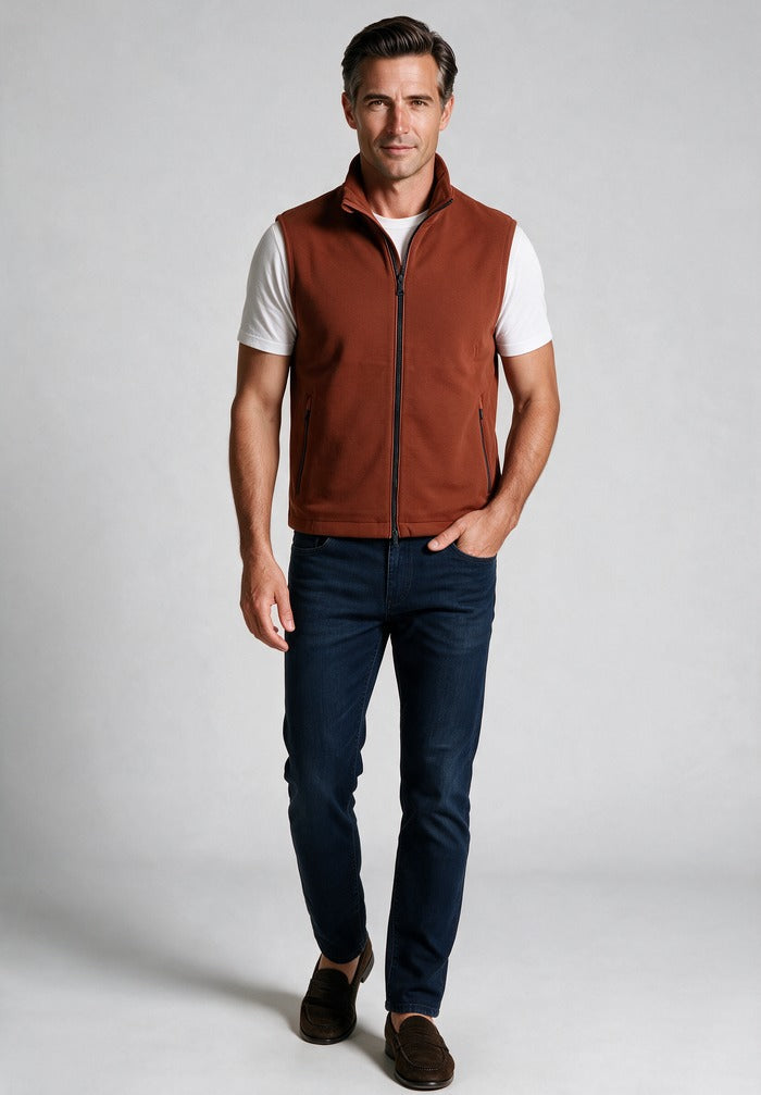 Techno Fleece Gilet, Rust — worn with denim