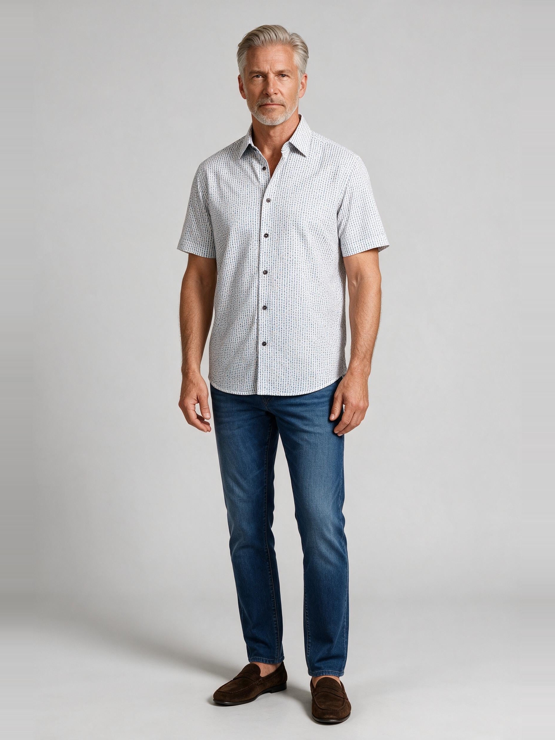 Bugatchi Ooohcotton S/S Miles Shirt, Air Blue, worn with denim | Mondo Uomo Naples FL